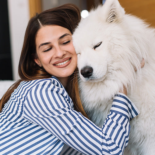 White dog with lady owner